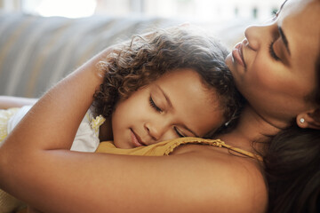 Mother, girl and sleeping hug on sofa in home, love and support child for security in living room. Mama, daughter and tired family nap on couch, relax and embrace for bonding together or dreaming