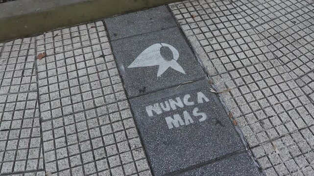 symbol of the mothers and grandmothers of the Plaza de Mayo and their motto of Never Again against the military dictatorship