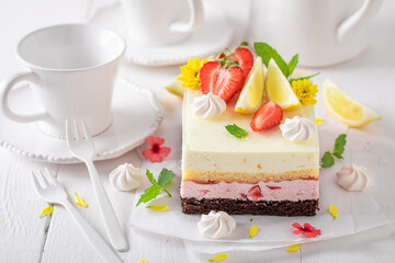 Sweet and tasty strawberry sponge cake with berries and lemon.