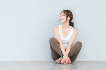 Fototapeta premium ヨガウェア・スポーツウェアを着た女性 