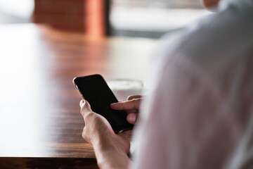 Portrait of a handsome young manworking with laptop in coffee shop cafe smile and happy face.