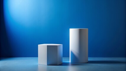 Two sleek white podiums of varying heights stand against a profound blue backdrop, evoking a sense of sophisticated simplicity.