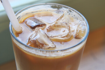 Close up of ice cubes in a glass of coffee, 