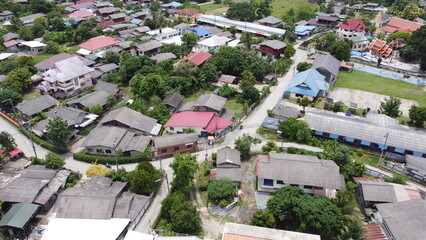 Aerial view of rice field and village in the countryside