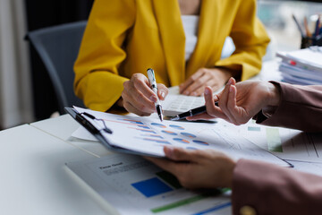 Closed up of two business brainstorm discussion, meeting of business team working financial trading growth, together, project team corporate briefing.