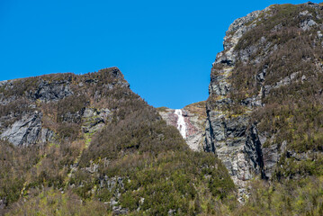One of several waterfalls high up in the mountains surrounding Western Brook Pond in Gros Morne National Park, Newfoundland, Canada

