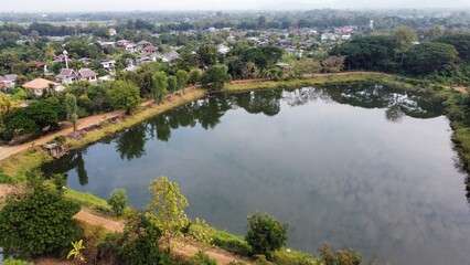 Obraz premium Panoramic view of small reservoir in countryside
