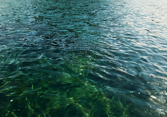 Children splashing in shallow water.