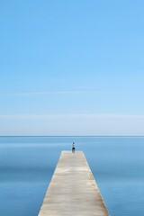 Fototapeta premium Man Walking on Pier