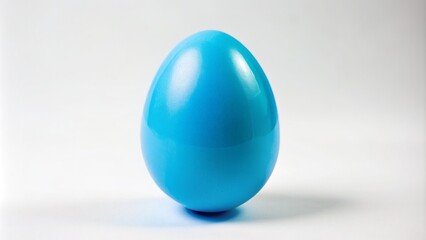 Isolated, solitary blue plastic Easter egg standing upright on a pristine, clean white background, devoid of any surroundings or distractions.