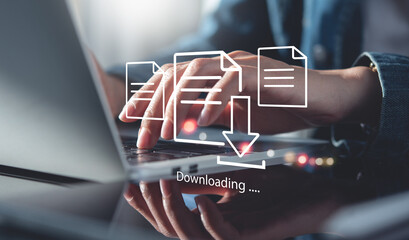 Business man downloading computer files or installing software on laptop computer, cloud storage...