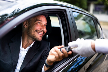 Experience luxury with our valet service as you hand over your car keys