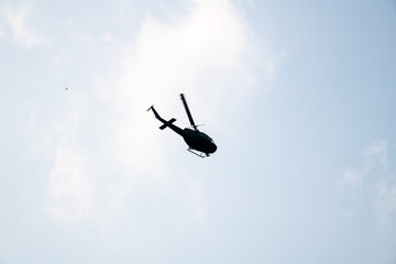 flying helicopter in the sky