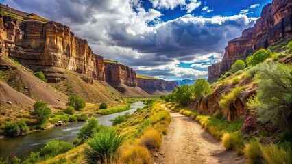 Naklejka premium Scenic trail surrounding a canyon, canyon, hiking, nature, landscape, outdoors, adventure, pathway, rocks, wilderness