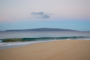 Golden Sunrise on Maui Beach with Clear Skies