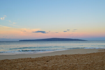 Serene Maui Beach at Sunrise with Clear Sky
