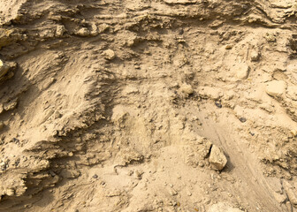 Naklejka premium Heap building sand material. Heap of sand texture background. The rough texture of construction sand. Building material background