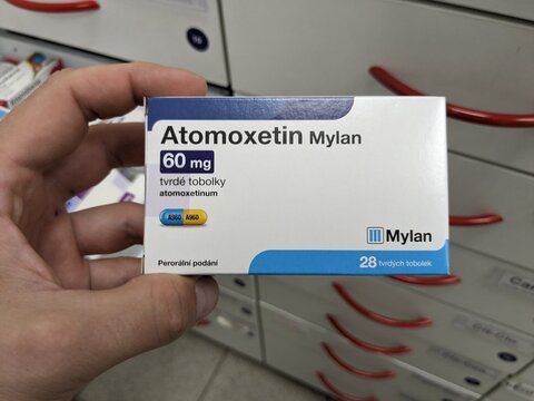 Prague, Czech Republic - July 10 2024: ATOMOXETIN MYLAN box of medication with ATOMOXETINE active substance by MYLAN, used for treatment of ADHD.