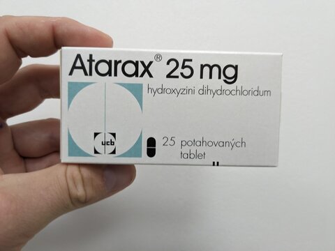 Prague, Czech Republic - July 10 2024: ATARAX box of medication with HYDROXYZINE active substance by UCB, used for treatment of anxiety, allergies, and sedation.