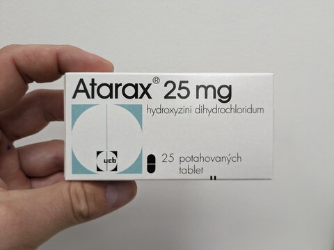 Prague, Czech Republic - July 10 2024: ATARAX box of medication with HYDROXYZINE active substance by UCB, used for treatment of anxiety, allergies, and sedation.