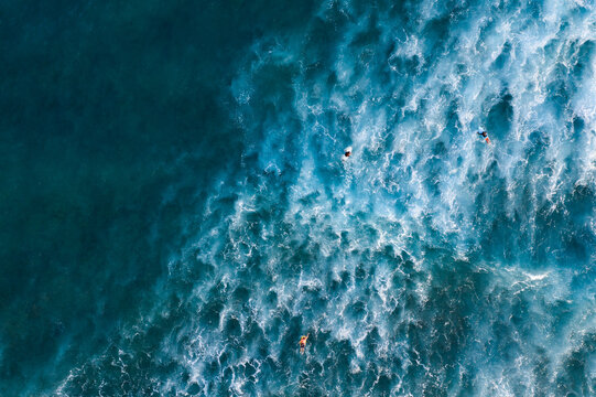 Aerial view of surfers paddling out, Waikiki, Oahu, Hawaii