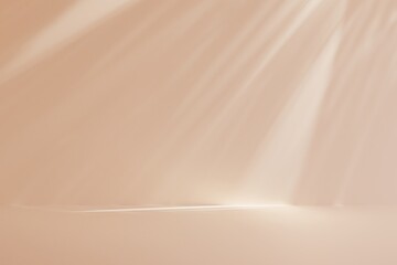 A light shining on a tan wall. The light is coming from the top left corner and is casting a shadow on the wall.