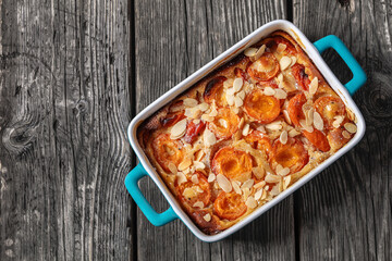 apricot clafoutis, apricot tart in a baking dish