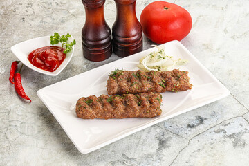 Kebab with beef served onion