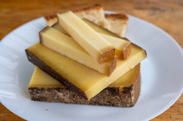 French aged in caves cheese Comte, made from unpasteurised cow milk Prestige,  Vieille Reserve close up