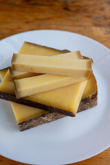 French aged in caves cheese Comte, made from unpasteurised cow milk Prestige,  Vieille Reserve close up
