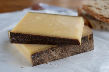 French aged in caves cheese Comte, made from unpasteurised cow milk Prestige,  Vieille Reserve close up