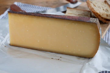 French aged in caves cheese Comte, made from unpasteurised cow milk Prestige,  Vieille Reserve close up