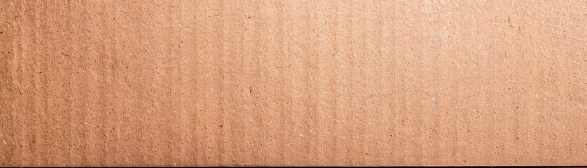 Fototapeta premium Close-up of textured cardboard surface, showing unique patterns and natural shades, perfect for background or material design resource.
