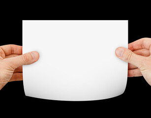 Blank business card in hands over black background