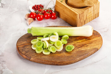 Ripe sliced leek over board