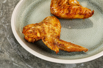 Tasty roasted chicken wing with spices