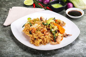 Asian cuisine - Fried noodles with seafood