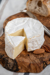 French soft Camembert cheese, original Camembert de Normandie made from raw cow milk