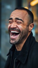 Fototapeta premium A man laughs with his eyes closed. AI.