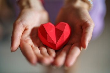 Hand give red heart