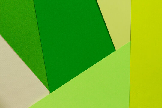 Colorful card board sheets layout in greens shades.