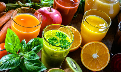 Glasses with fresh organic vegetable and fruit juices