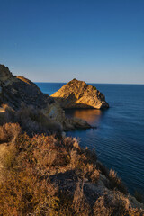 rocky bay calm blue sea