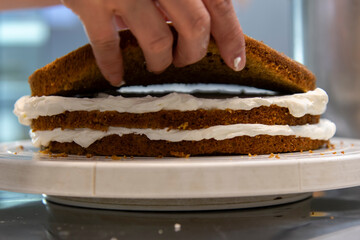 view of making cake with bread and cream