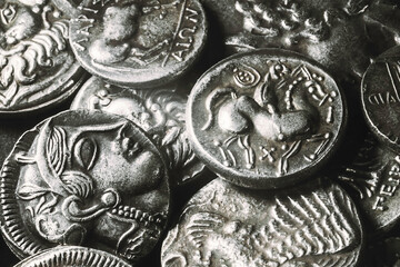 Pile of Ancient Silver Coins © allexxandarx