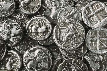Pile of Ancient Silver Coins © allexxandarx