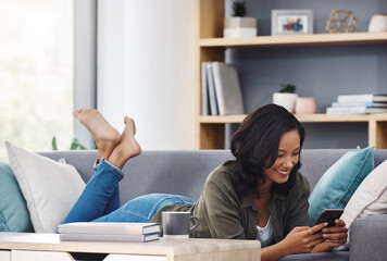 Lounge, woman, and cellphone on couch for relax, social media and reading or streaming in home....