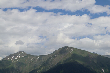 Mountains in summer. Clouds over the mountains.