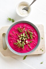 Delicious cold summer beetroot soup with cucumber and dill