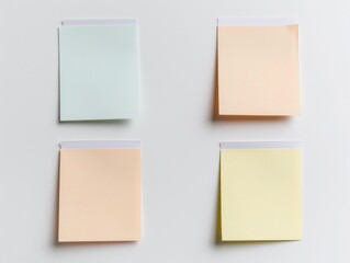 Fototapeta premium Four Blank Sticky Notes on a White Background